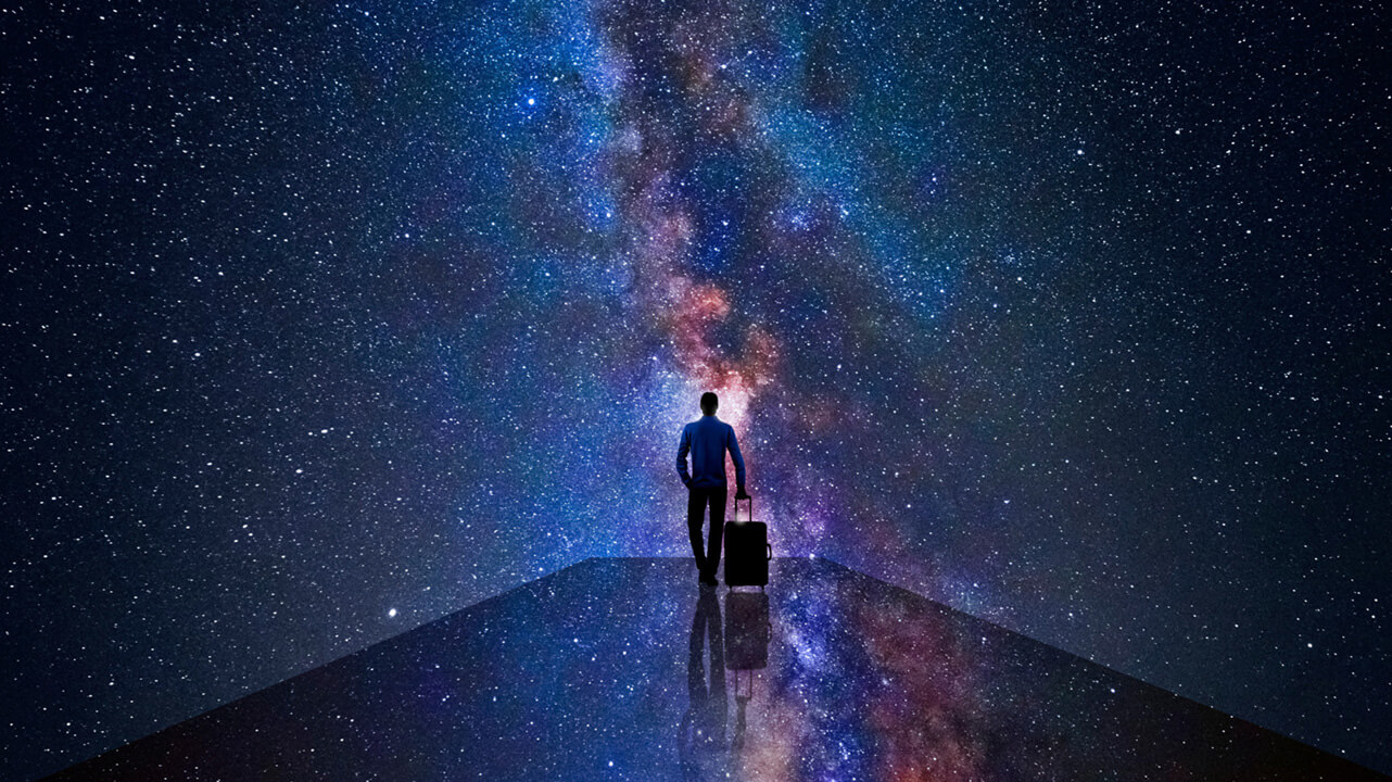 man walking through the universe
